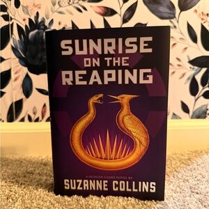 Sunrise on the Reaping by Suzanne Collins - Purple and Gold Edition